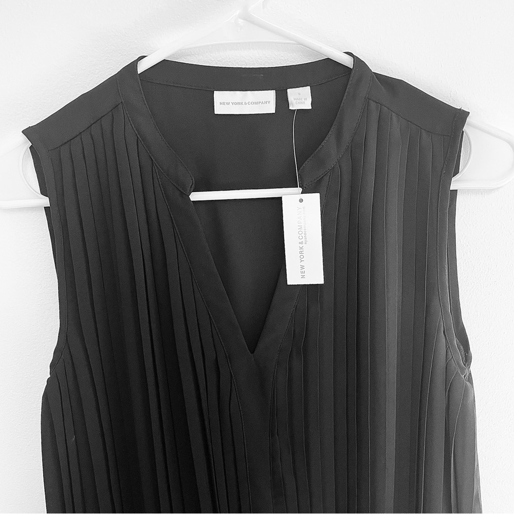 New York and Company Sleeveless V Neck Blouse with Ruffles on front